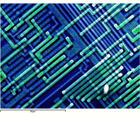 Semiconductor Chip de-capped for trace editing by FIB